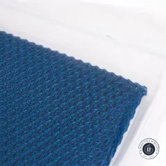 Gefaltetes Musterstück des ByAnnie's Lightweight Mesh in Blastoff Blue freigestellt ohne Verpackung.